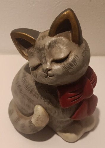 Rara statuina thun - thun, gatto