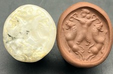 Targhetta dell'Asia centrale dei leoni della lotta gladiatore corniola romana