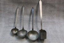 vecchi mestoli e pentole in alluminio arredo taverne 