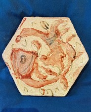 Antica piastrella in