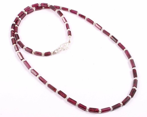 Collana perle forma di - di,