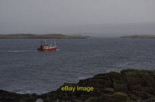 Photo 6x4 Returning home to