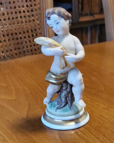 Statuina porcellana biscotto