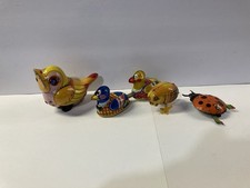 Giocattoli animali latta