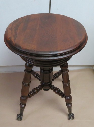 Antico sgabello pianoforte