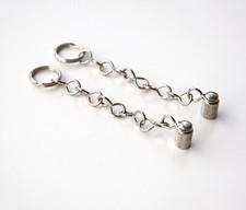 Coppia di tappi per valvole