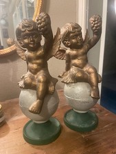 2 putti in ghisa h 25 cm