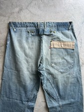 Fibbia jeans intrecciata