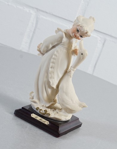 Bambina porcellana - in,