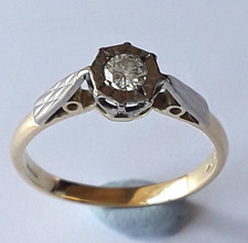 Anello solitario in oro giallo