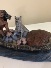 statuina kayak guida con cane