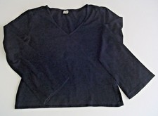 Maglietta donna nera, scollo a V, leggermente elasticizzata, maniche a campana