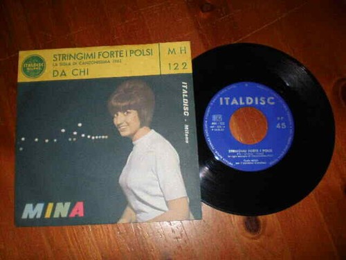 Mina stringimi forte i polsi - -,