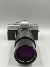 Minolta SRT 303 b fotocamera analogica Vivitar 75-205 mm f obiettivo zoom macro 3.8