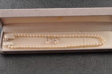 Collana e orecchini di perle