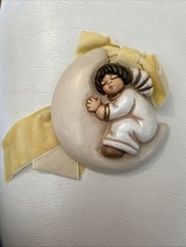 Formella Thun. Angelo Su Luna