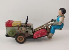 Ragazza sul trattore gioco in latta tin toy anni 70 carica a molla