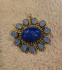 Spilla pendente fiore cabochon