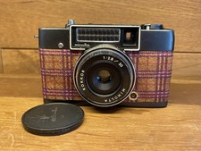 EXC + 5 Minolta Repo Opaco