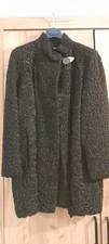 Cappotto di Astrakan nero di