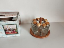 set 8 porta spezie circolari su base in legno vintage