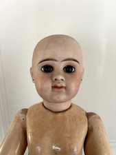Rare poupée ancienne par