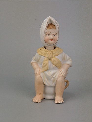 Antica statuina annuire vasino