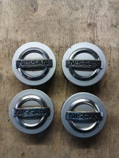 Set 4 tappi centrali cerchi in lega originali Nissan Micra Pixo Juke Almera Qashqai.