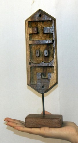 Antico legno intagliato a - di,