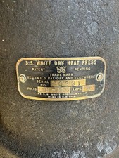 Antica pressa di calore a