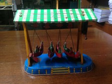 GIOCATTOLO GIOSTRA IN LATTA