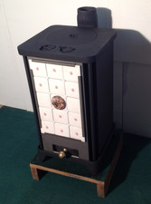 STUFA A LEGNA A FIAMMA INVERSA