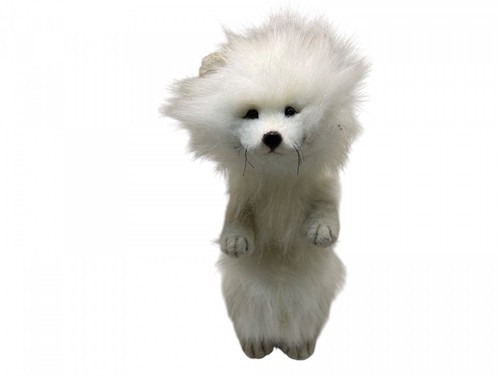 Artista peluche volpe artica