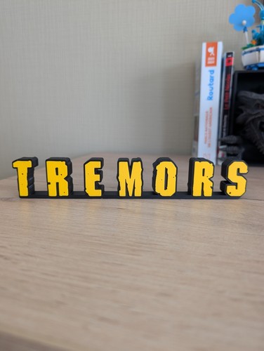 Logo tremors enseigne - -,