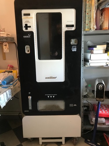 Distributore automatico - , di