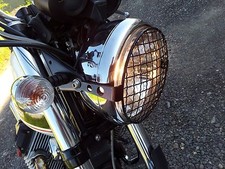 Griglia proteggi faro per Moto