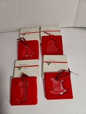 Lotto di 4 decorazioni