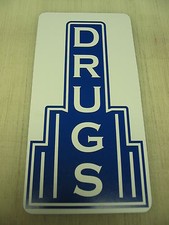 Insegna in metallo DRUGS