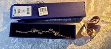 Swarovski crystal and beaded - and,