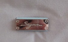 Griffe, logo, marchio Segue per borse, tracolle, portafogli