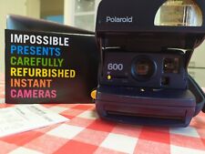 Polaroid 600 IMPOSSIBLE. Usa pellicole a sviluppo istantaneo.