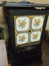 stufa a legna in ghisa usata