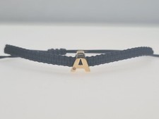 bracciale oro 18 kt gr.2,30 - Lettera A - Mod."stringi/allarga" con brillantino