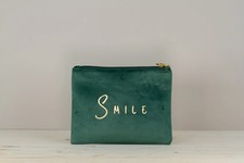 Pochette in velluto, porta