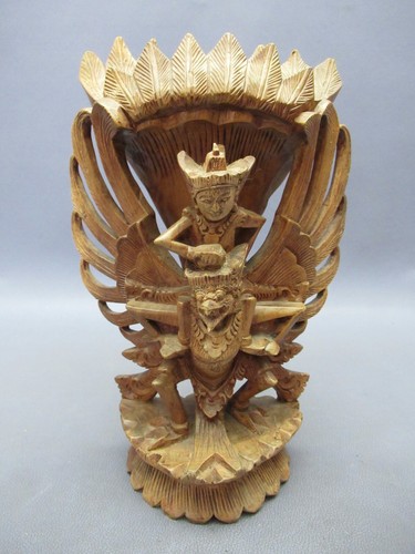 Scultura legno intagliato