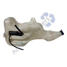 Bottiglia e motore lavatrice