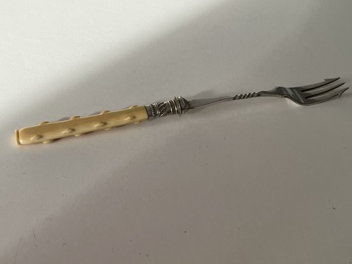 Antique pickle fork with - pickle,