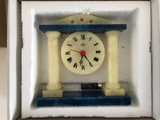 Orologio romano in alabastro