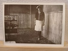 Girl in uniform advertising