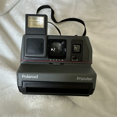 Polaroid impulse camera with - polaroid,